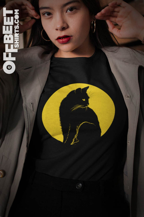 Womens Graphic t-shirt. Cat in the moonlight.  Image of a cat against a yellow moon and text: Cat in the moonlight. pretty, simple, sexy  I  Offbeet Shirts