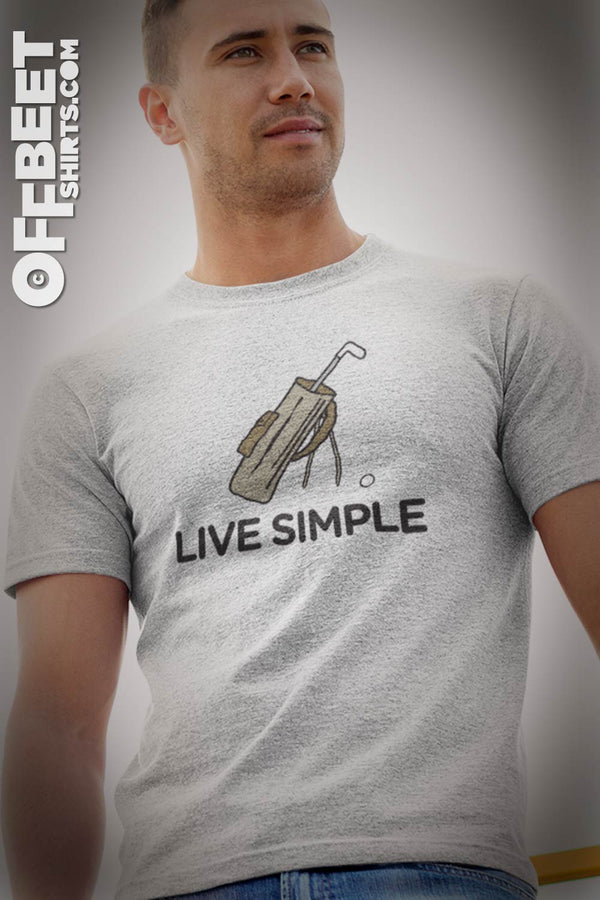 Live simple golf Men’s Graphic t-shirt.. Uncomplicated message delivered simply - All you need is less. Graphic of golf bag with only one club with live simple text. Men’s White,  t-shirt ©Offbeet Shirts.