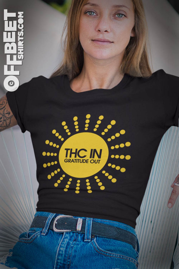 THC in gratitude out Women’s graphic T-Shirt- Stylish day or evening and a bit of fun. THC is the active “high” compound in cannabis. We thank the gods.. Stylised Sun graphic Men and Womens Black t-shirt  I  © 2019 Offbeet Shirts original design