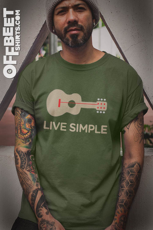 Live Simple one string guitar Men’s Graphic T-shirt. Uncomplicated message delivered simply - All you need is less. Graphic of 3 hole harmonica with live simple text. Men’s Ashphalt or olive t-shirt ©Offbeet Shirts