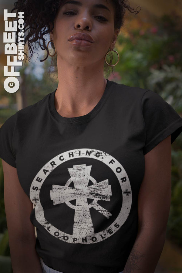 Searching for loopholes Women’s Graphic T-shirt. White graphic of Christian cross with a magnified glass over the centre. Womens Black t-shirt  I  © 2019 Offbeet Shirts original design