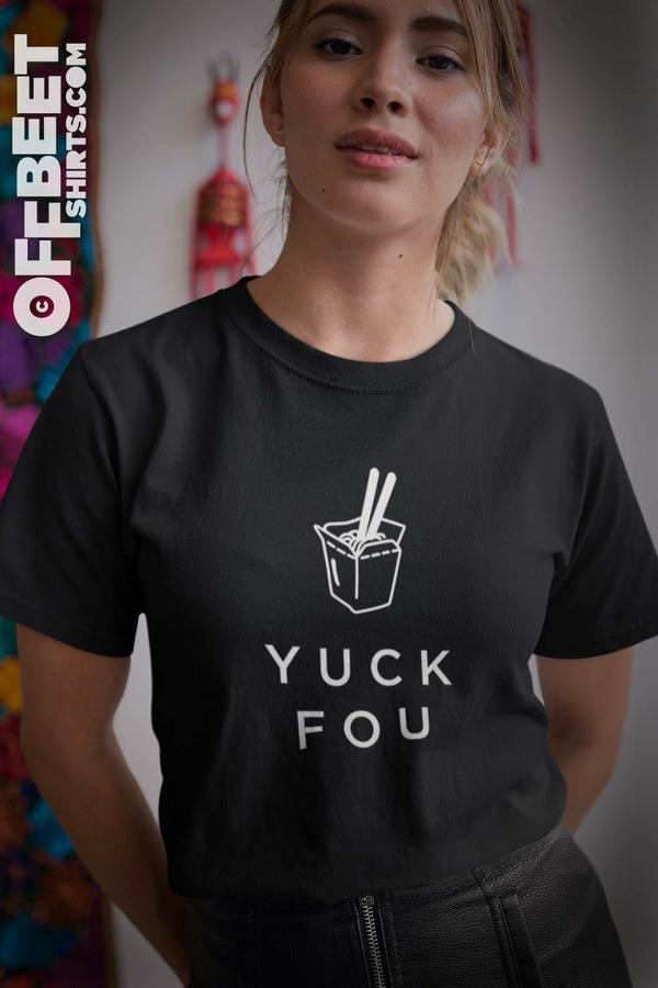 Yuck Fou Women’s Graphic T-shirt. White graphic of the words YUCK FOU with a Chinese take-away box with chopsticks. Womens and Mens black t-shirt  I  © 2019 Offbeet Shirts original design