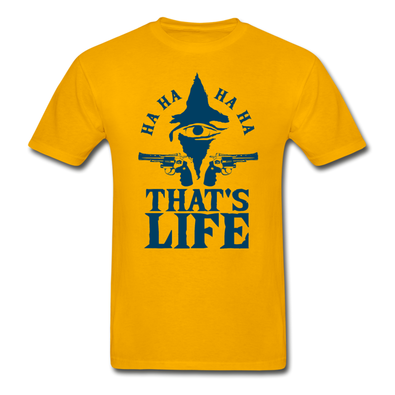 That’s Life Men’s Graphic t-shirt. The joker 2019 painted eye with 2 revolvers pointing left and right with text at the top ha, ha, ha, ha and below That’s Life.  ©Offbeet Shirts. Color - gold