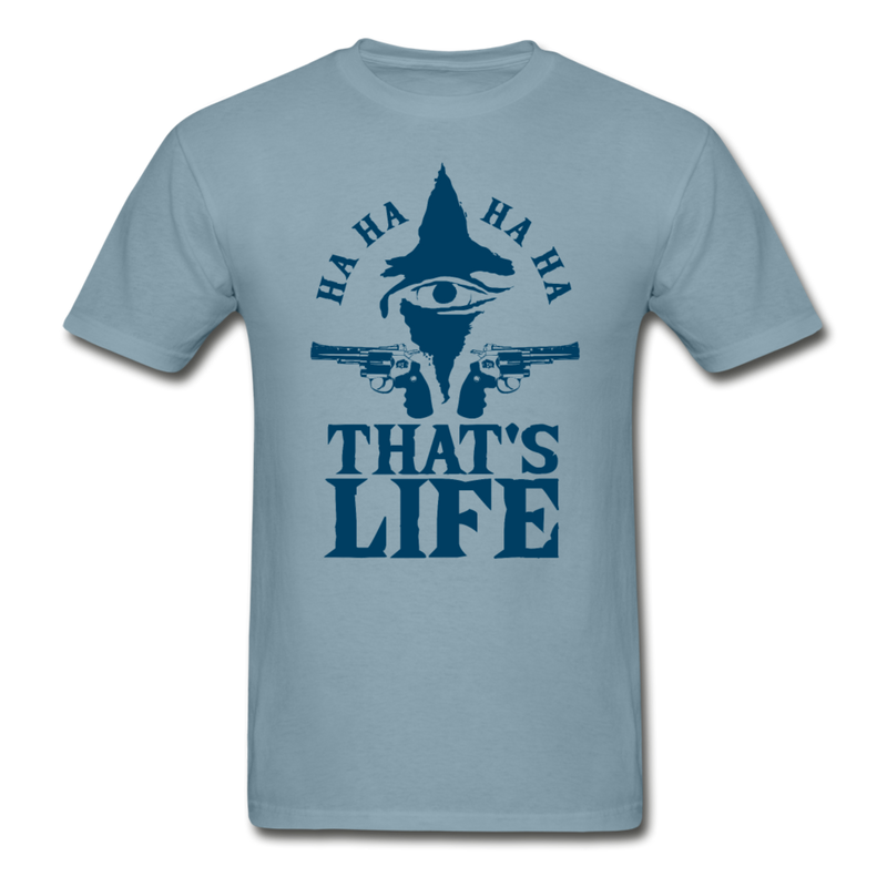 That’s Life Men’s Graphic t-shirt. The joker 2019 painted eye with 2 revolvers pointing left and right with text at the top ha, ha, ha, ha and below That’s Life.  ©Offbeet Shirts. Color  stonewash blue